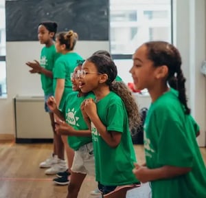 Camp Corlears - older campers cheering on their friends