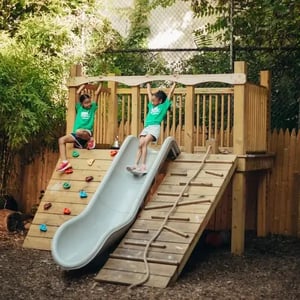 Camp Corlears - older campers having fun on the slide
