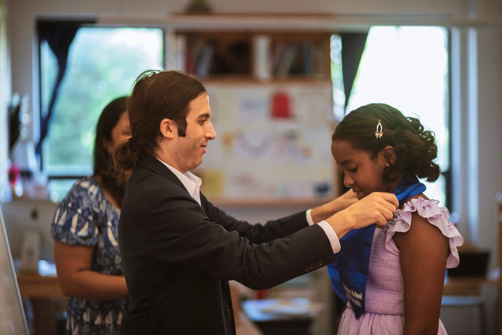 Graduation day 2022 - Josh with a student